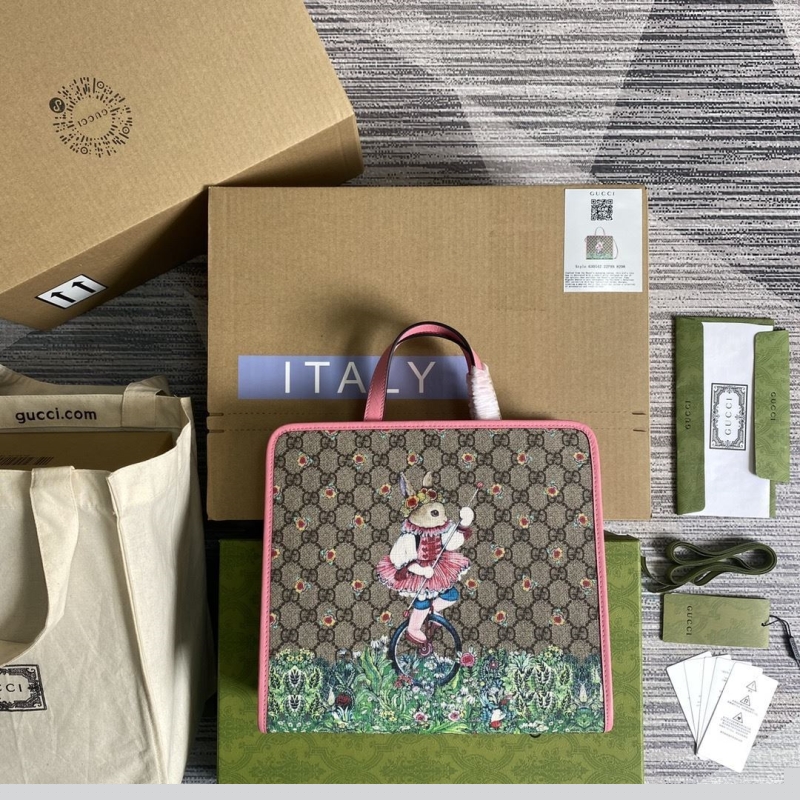 G*u*i shopping bags